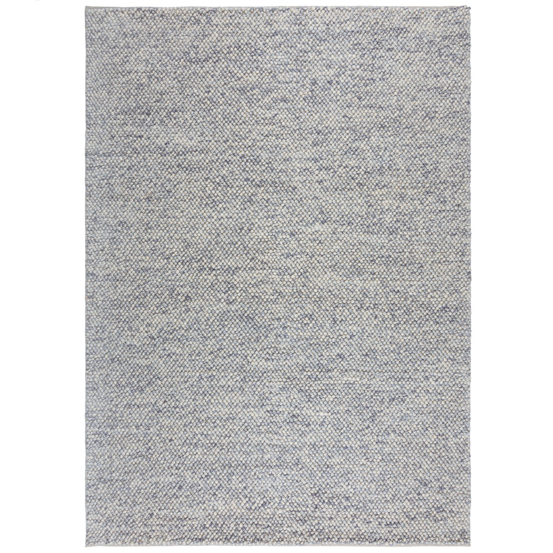 tapis en laine effet bulle de couleur bleu sur fond blanc#couleur_bleu