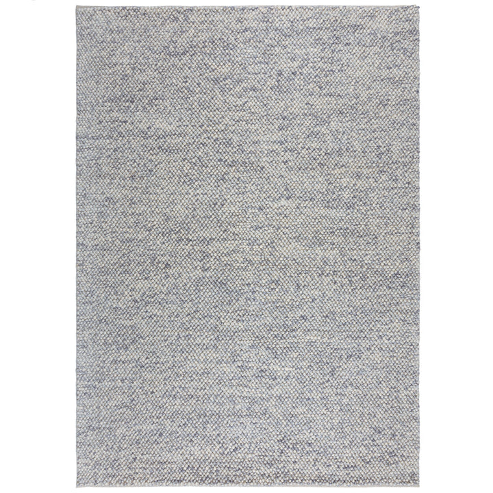 tapis en laine effet bulle de couleur bleu sur fond blanc#couleur_bleu