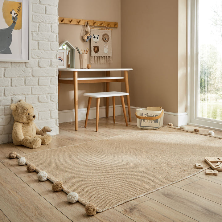 vue dans une chambre d'enfant du tapis pompom couleur naturel#couleur_beige