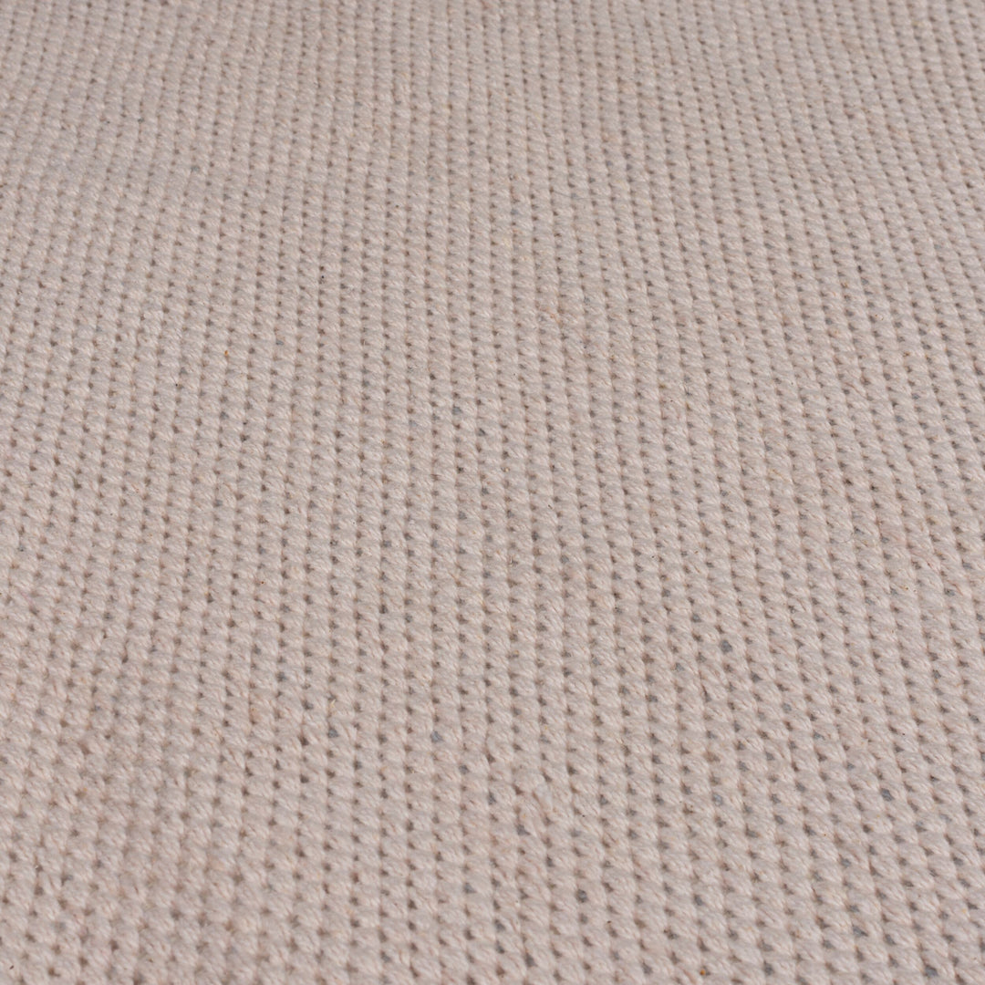 zoom sur la matière du tapis pompom coloris rose#couleur_rose